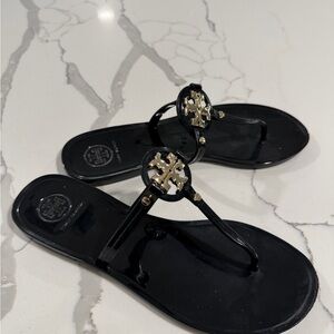 Tory Burch Black Sandals with Gold Accents